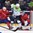 OSTRAVA, CZECH REPUBLIC - MAY 8: Slovenia's Tomaz Razingar #9 tries to deflect the puck past Norway's Lars Haugen #30 during preliminary round action at the 2015 IIHF Ice Hockey World Championship. (Photo by Richard Wolowicz/HHOF-IIHF Images)

